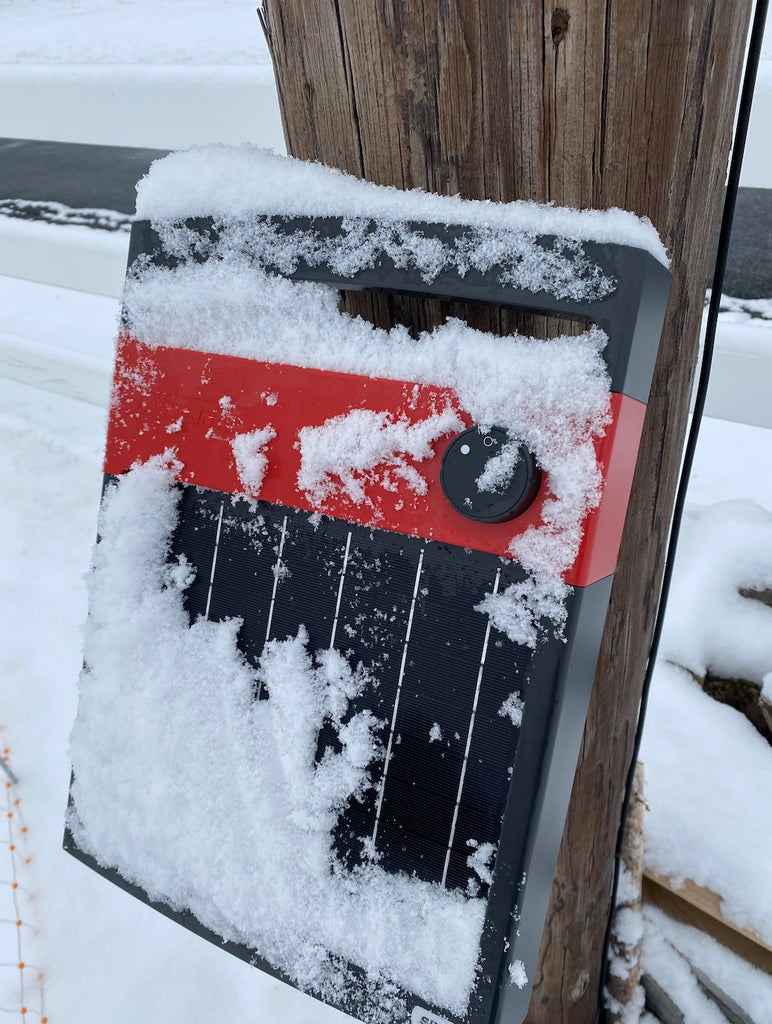 Snow cover on solar panel fence chargers. Will it still work?
