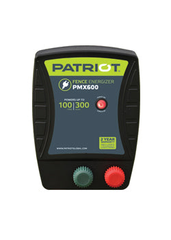 black housing and green sticks of a Patriot Pmx 600 electric fence energizer