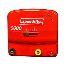 Front of a Speedrite 6000 dual powered electric fence unionizer with fence terminal connection knobs and white background