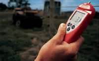 SPEEDRITE REMOTE CONTROL and farmer checking electric fence at farm